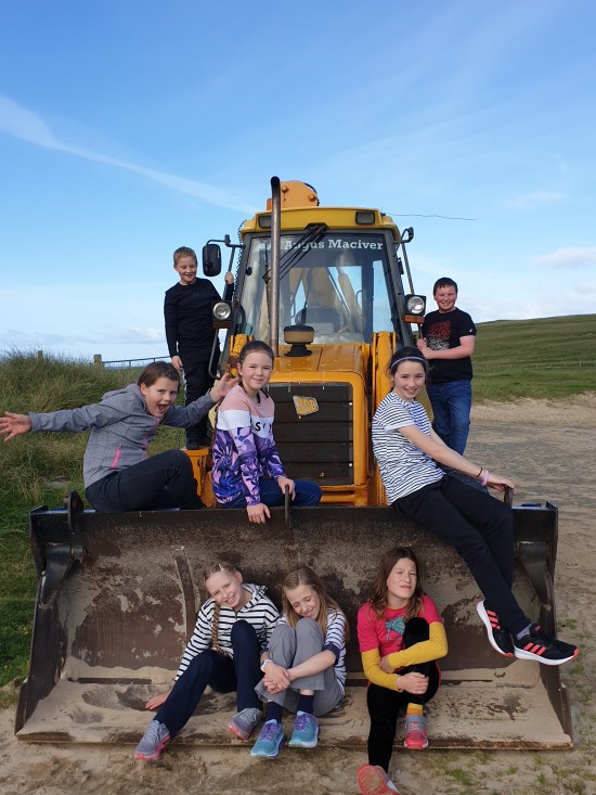 children playing on traktor